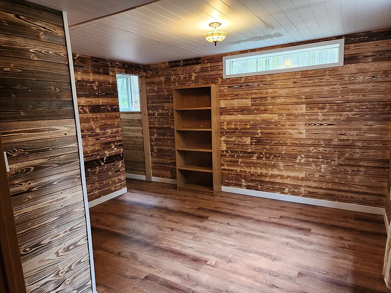 smaller of 2-room basement suite