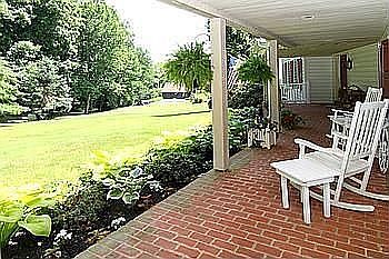 Brick floored long front porch