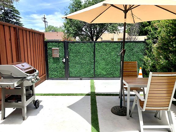 Outdoor BBQ and Dining Area. Chairs can adjust to Lounge. Total Privacy. Umbrella with Solar lights.