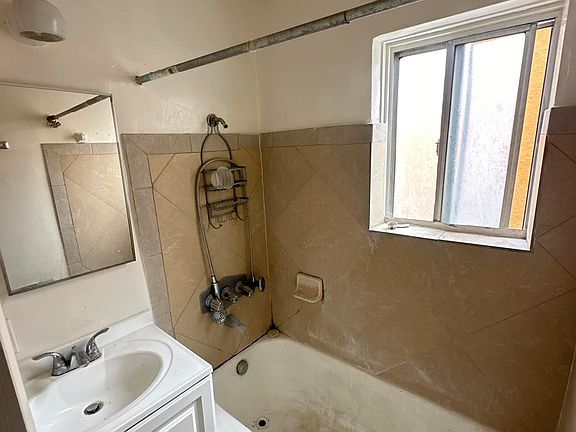 Bathroom w/Full Bath, Vanity Sink and Tile Floors