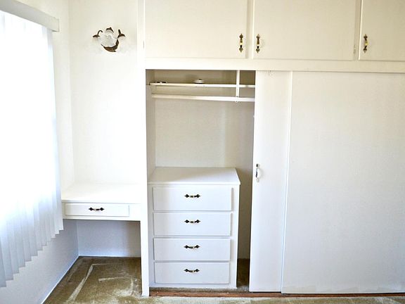 bedroom with built ins