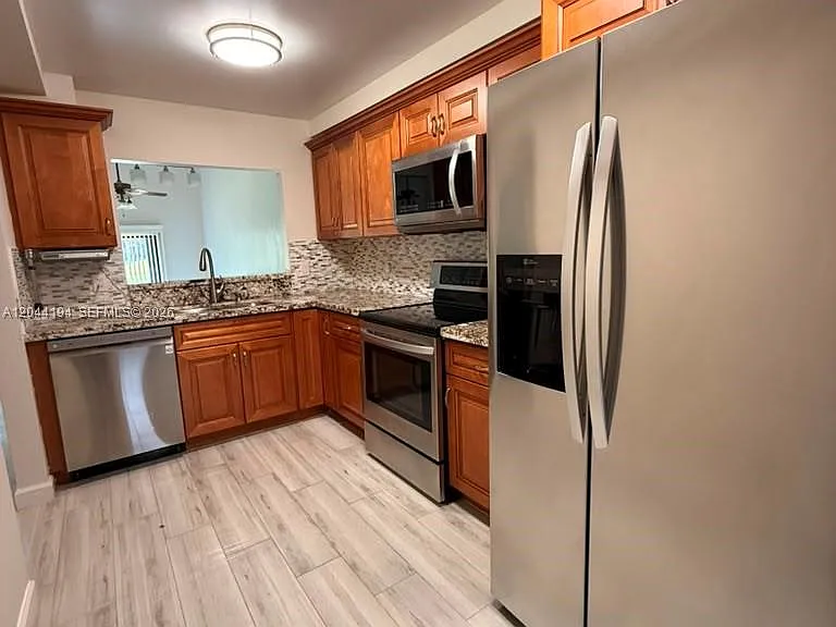 4182 S Pine Island Rd — Photo 1