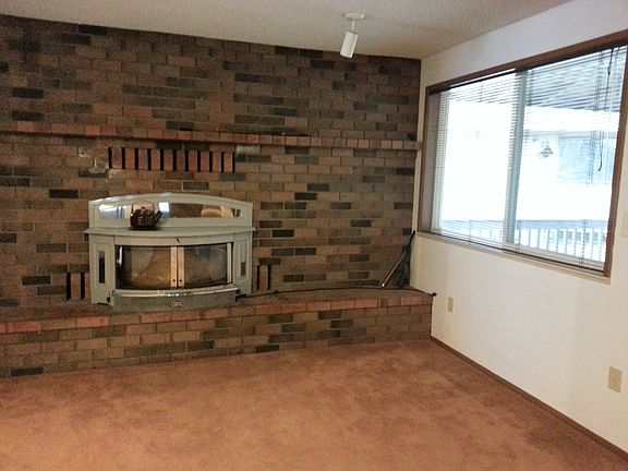 Very lg. Rec-room with word burning stove