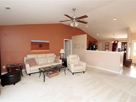 THIS VIEW OF GREATROOM ALLOWS VIEWING OF THE KITCHEN AND LARGE ENTRYWAY.