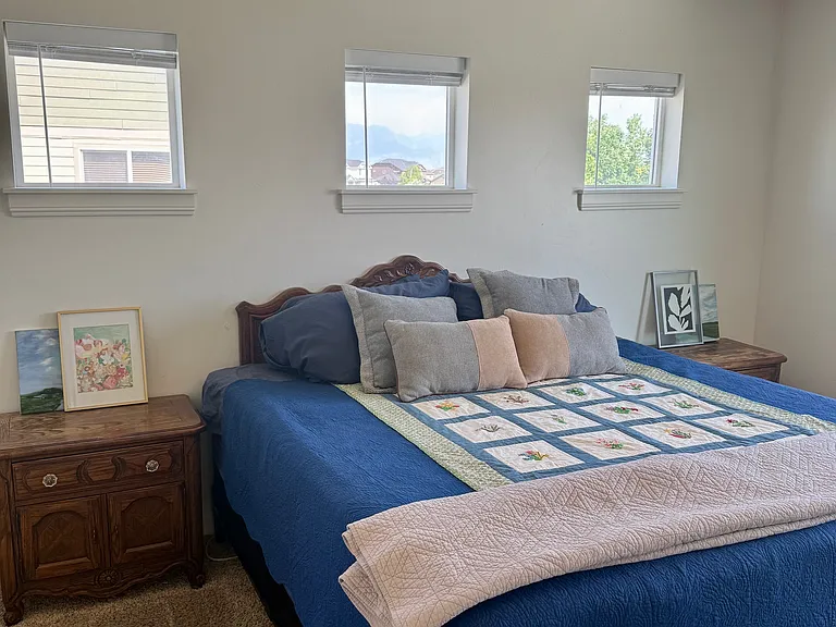 Master bedroom with double vanity ensuite and river/mountain views.