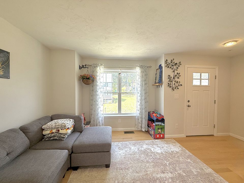 Living room with front entrance door