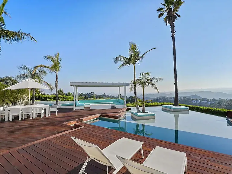 Bask in the glorious daytime sun on the spacious deck, perfect for soaking up the warm rays and enjoying outdoor activities.