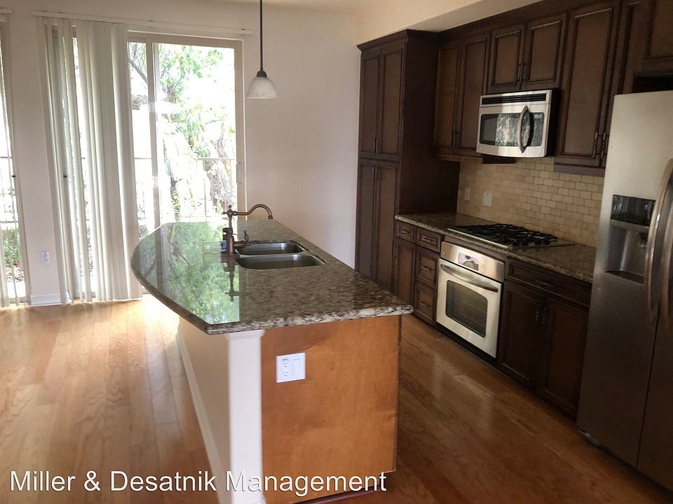 1st image of 23130 Sherman Pl Unit 102