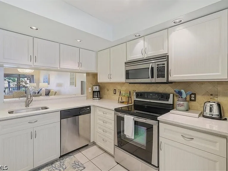 11921 Seabreeze Cove Ln #202 — Photo 5