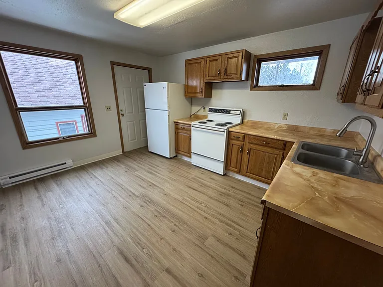 Looking into kitchen from bathroom door