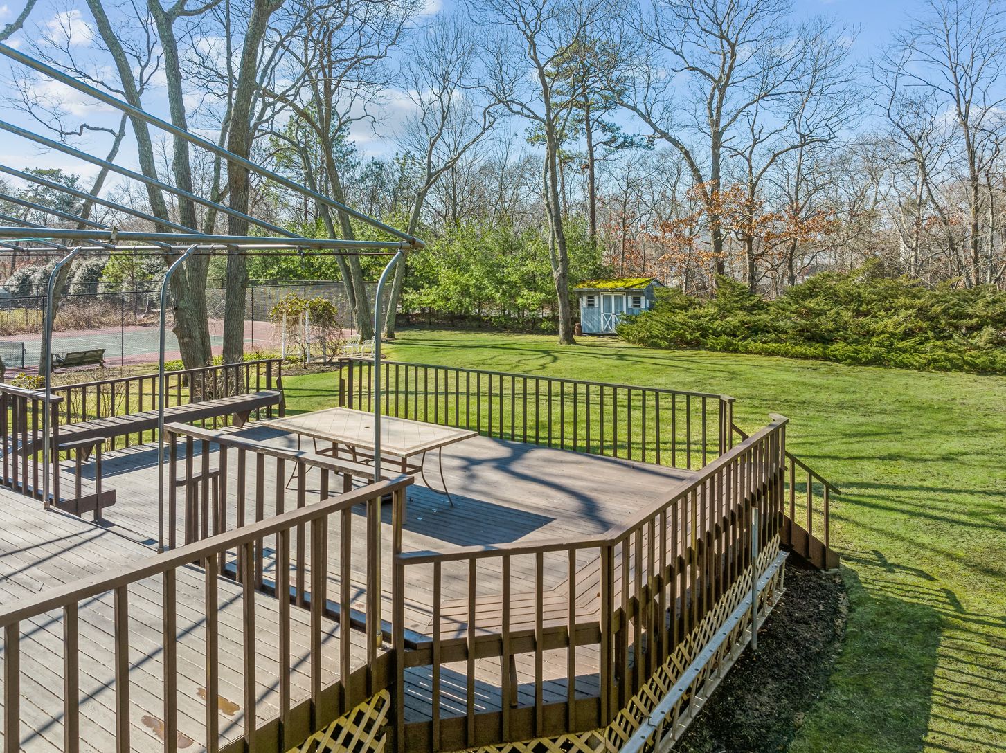  Multi-level expansive deck. Upper portion with custom awning (to be installed mid April)