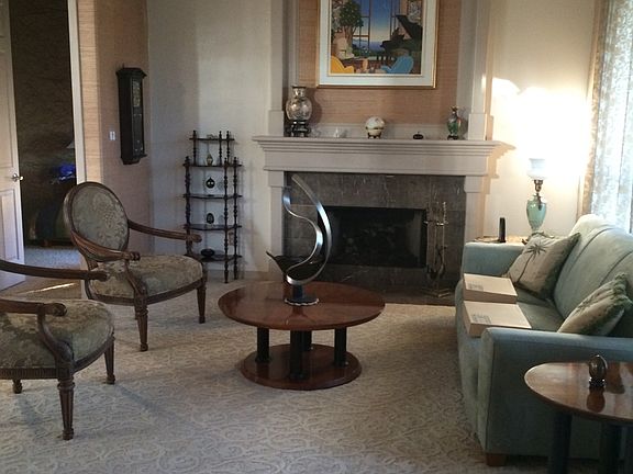 Open living room w/fireplace