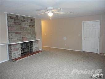 Another View of Fireplace and Living Area