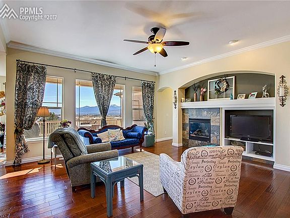 Living room with Front Range Views and engineered wood floors