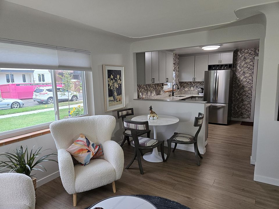 The entire house was gutted and remolded this summer. The open plan gives an expansive feel to the space. All new paint, floors, shades and fixtures provides a neutral cohesively decorated space for your furniture to fit in to.