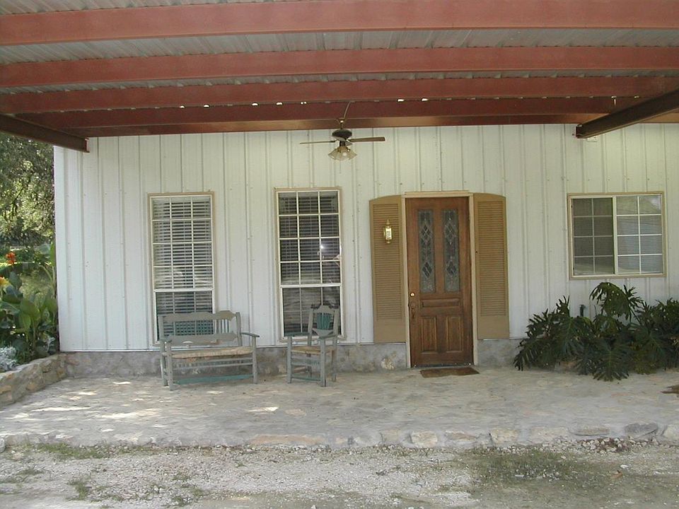 Patio Area with 2 covered parking spaces