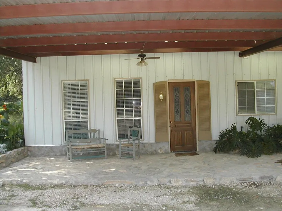 Patio Area with 2 covered parking spaces