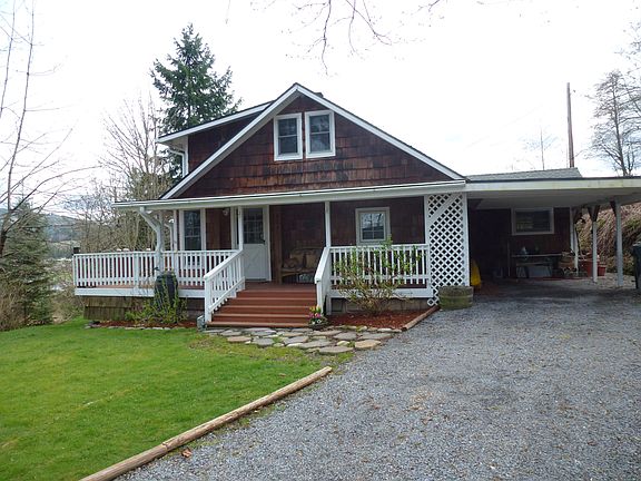 Carport and extensive decks