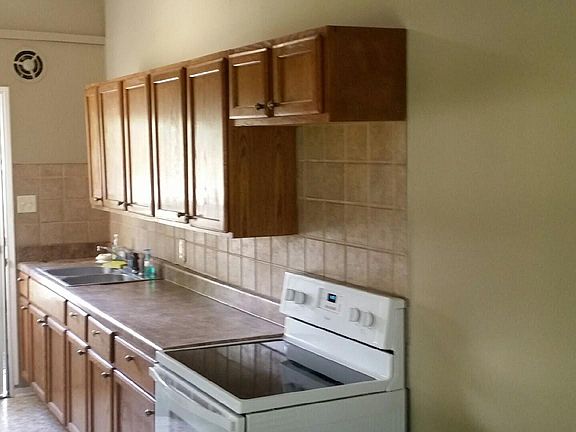 Spacious kitchen with new appliances to include a new stove
