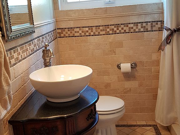 Full bath,first floor tiled 