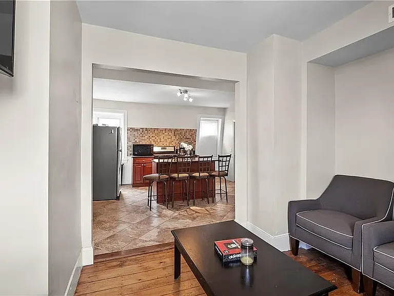 Living room looking into kitchen