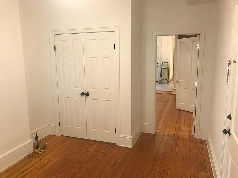 Front bedroom looking into dining area. Floors were all refinished