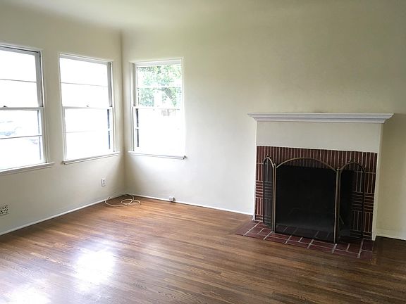 Living room fireplace and windows