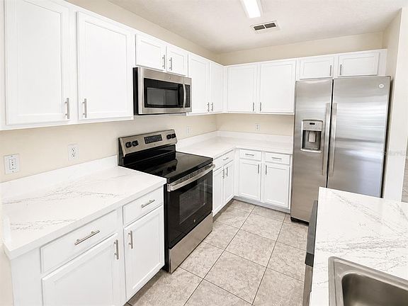 3rd image of 13507 TEA ROSE WAY #128