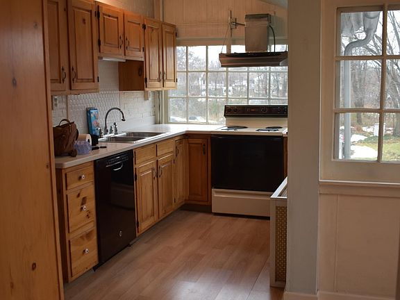 Charming south and east facing kitchen. Corian countertops. Eat-in breakfast nook.