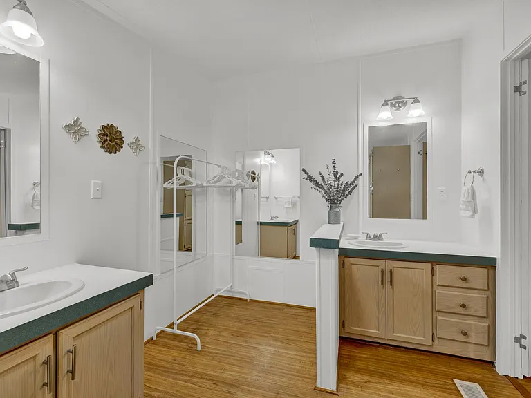en suite master bathroom with new shower and toliet. lots of storage