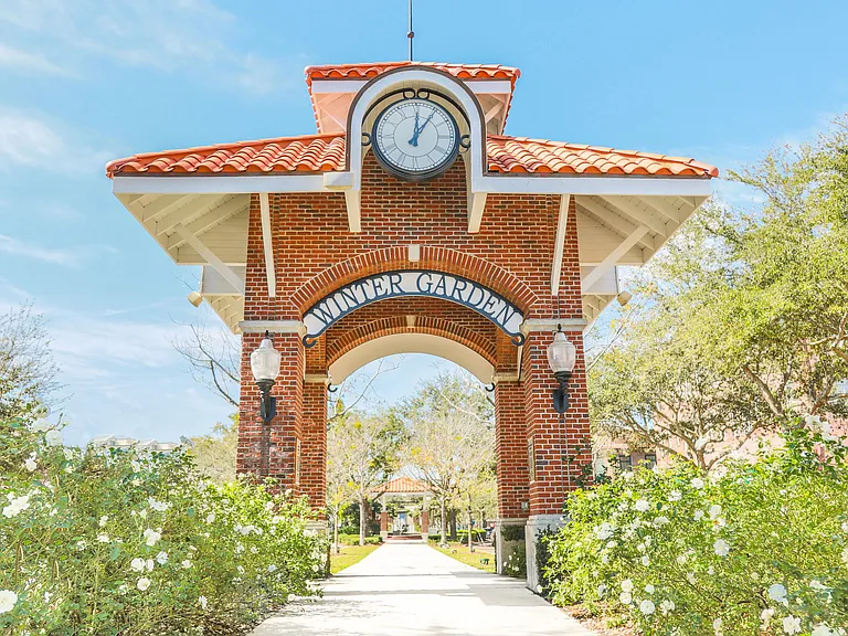 The iconic Centennial Clock Tower, a gathering spot for Winter Garden's vibrant events.