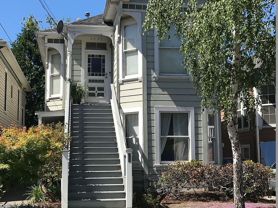 Front of the house. The downstairs entrance is along the left side of the house.