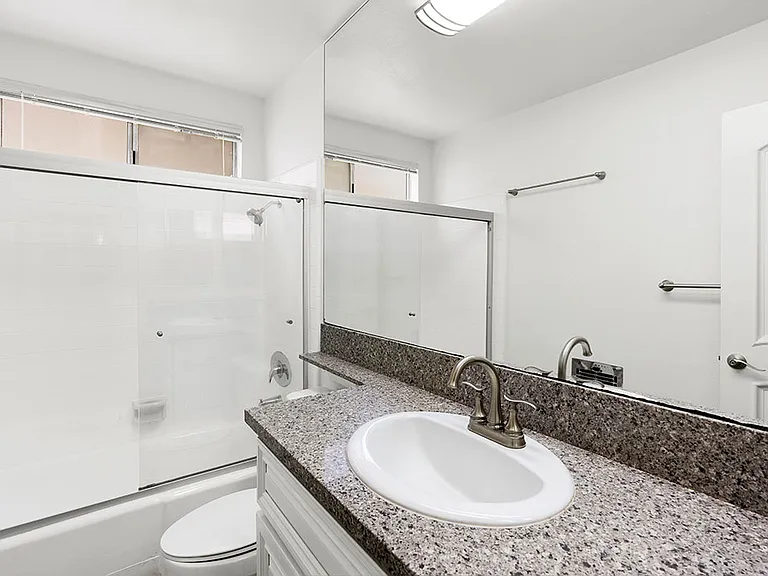 Modern styled bathroom with shower and tub.