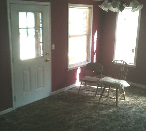 Den with entry from the side