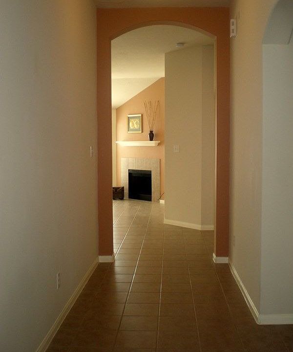 Arched entry - tiled through family room and dining.