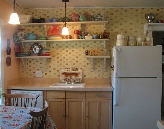 Kitchen with hand stenciled wall