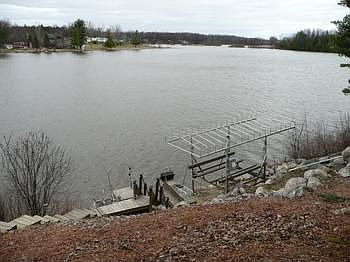 The dock system and motorized boat lift stay!!