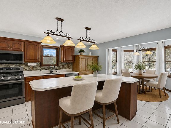 5th image of 9522 Timberbank Cir NW