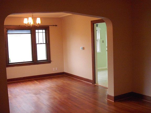 Formal dining room that leads to spacious kitchen and dining area