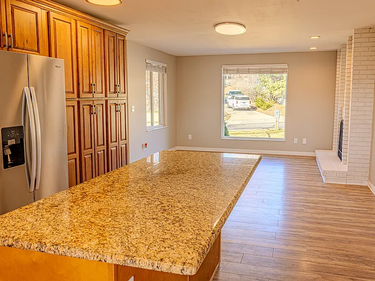 Kitchen facing the dining area with oversize window