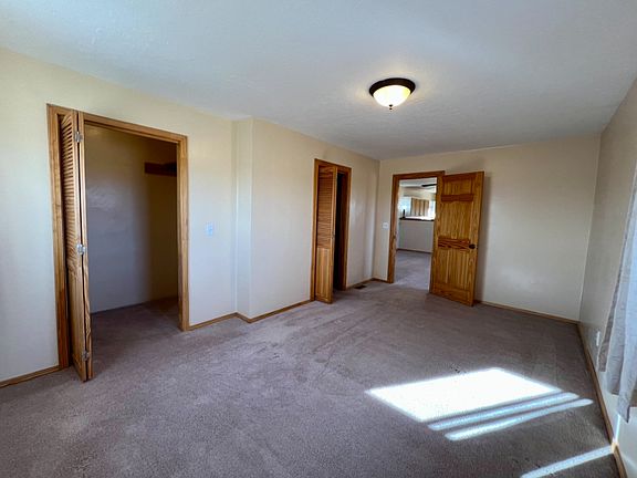 Upstairs bedroom with walk in closet and a full bathroom
