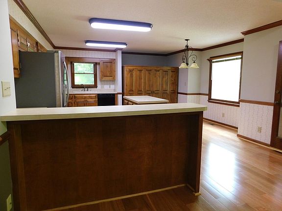 Bring your barstools! Large picture window at the breakfast nook.