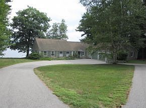 Circular drive and large yard