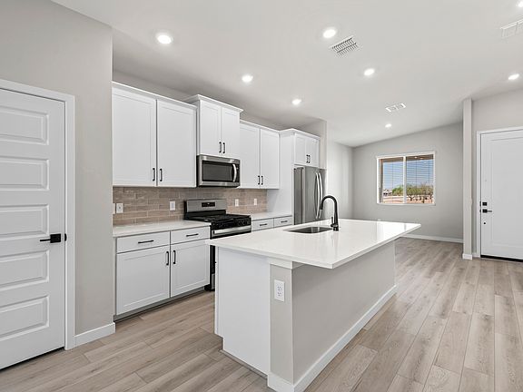 A chef-ready kitchen awaits.