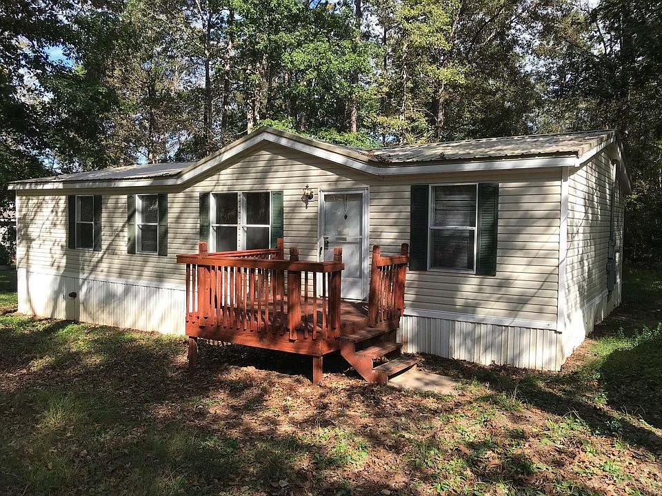 Front view of the home sites on a half acre private lot