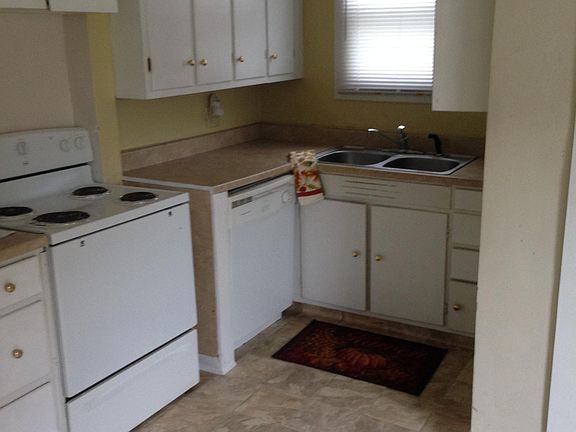 Kitchen: Electric stove, Frig, disposable & YES a dishwasher. Plenty of cabinets for your cooking needs.