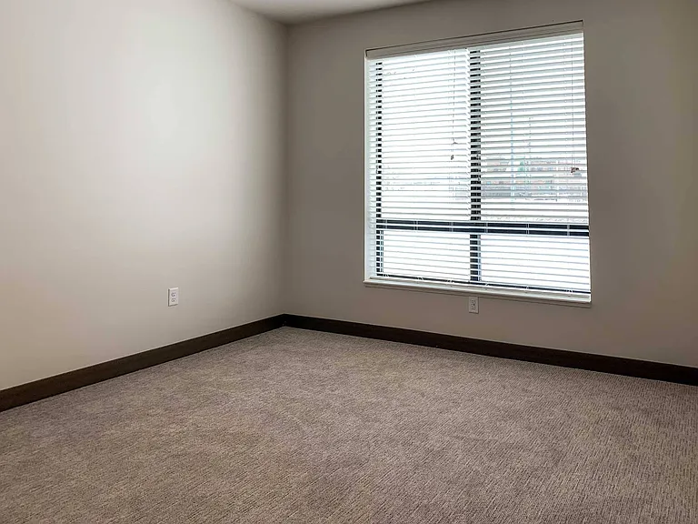 You'll love our large bedroom windows that let in plenty of natural light.