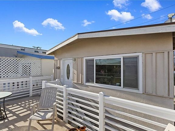 Arrive on your expansive (nearly 200 sq. ft) porch