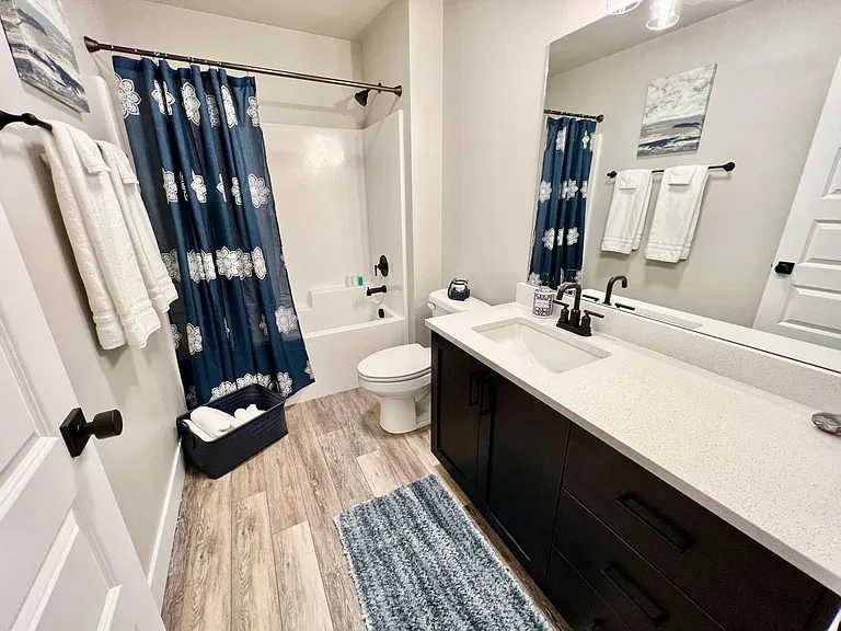 Another full bathroom by the spare bedrooms.