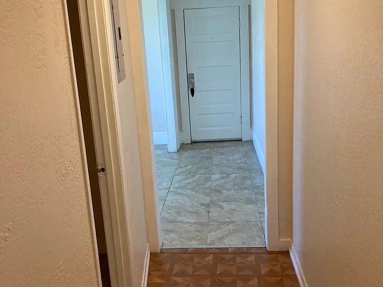 Hall way from bedroom looking past bathroom.